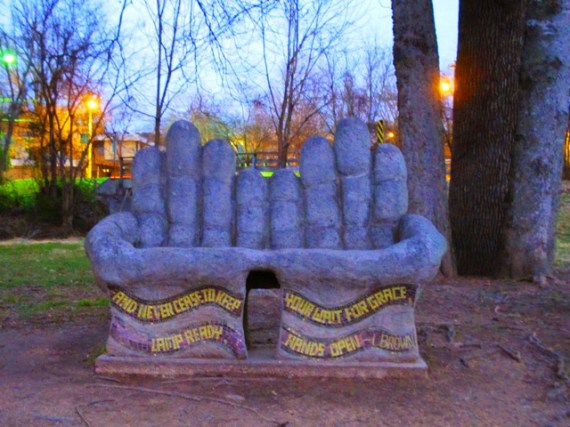 park bench of open hands